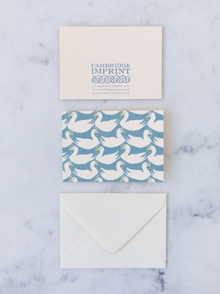 Card front, card back depicting Cambridge Imprint Label and the envelope all lined up. 
