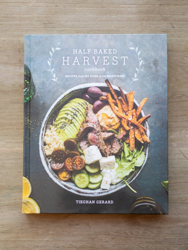 The cover of the cookbook displaying a bowl full of various ingredients.