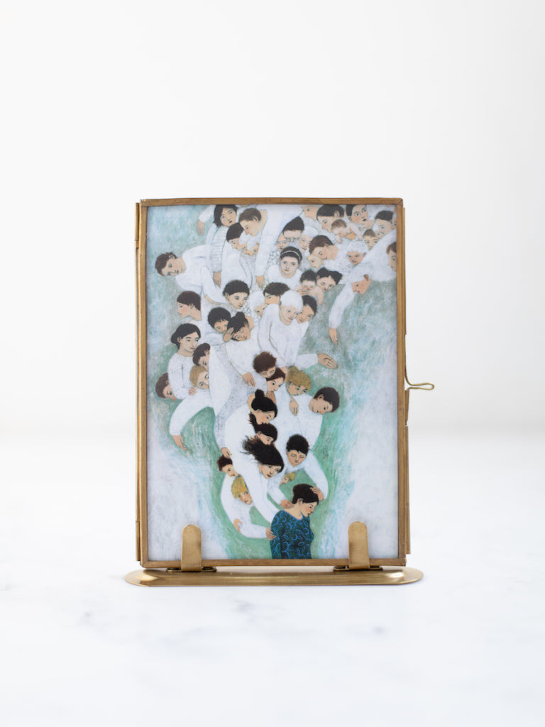 She Will Find What is Lost by Brian Kershisnik in a small brass frame.