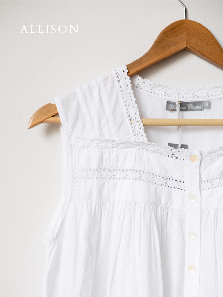 A close up shot of the lace detailing of the Allison White nightgown. The lace is flowery. 