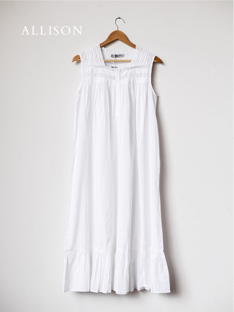Far shot of the Allison nightgown. It is white, long, and delicate.