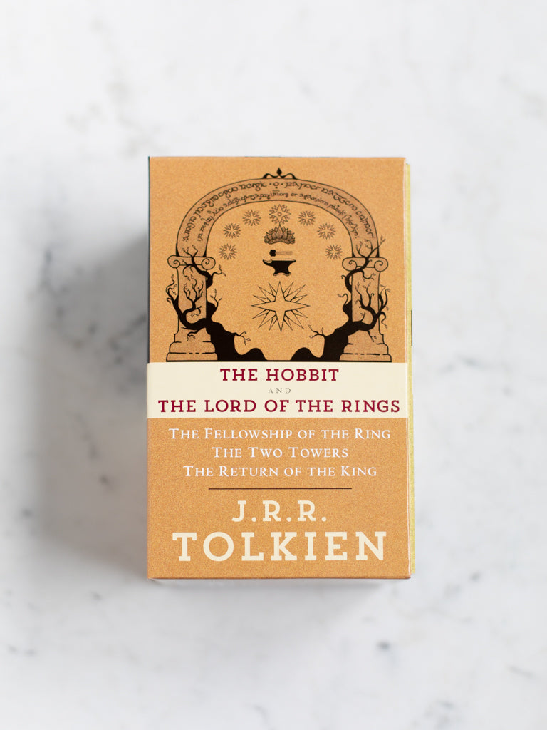 The side of the box set featuring an illustration of a gate and a list of the works included in the set. 