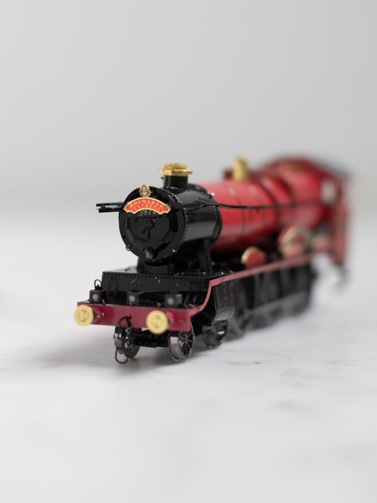 The red Hogwarts Express train metal model.