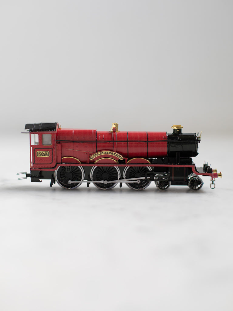 The red Hogwarts Express train metal model.