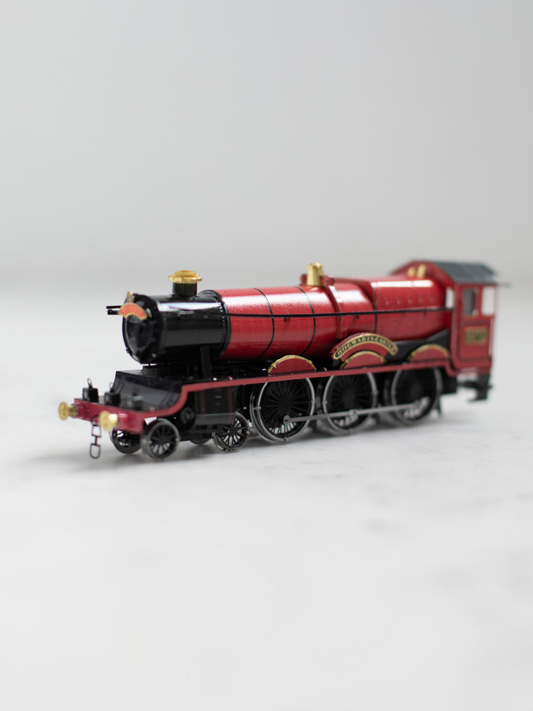 The red Hogwarts Express train metal model.