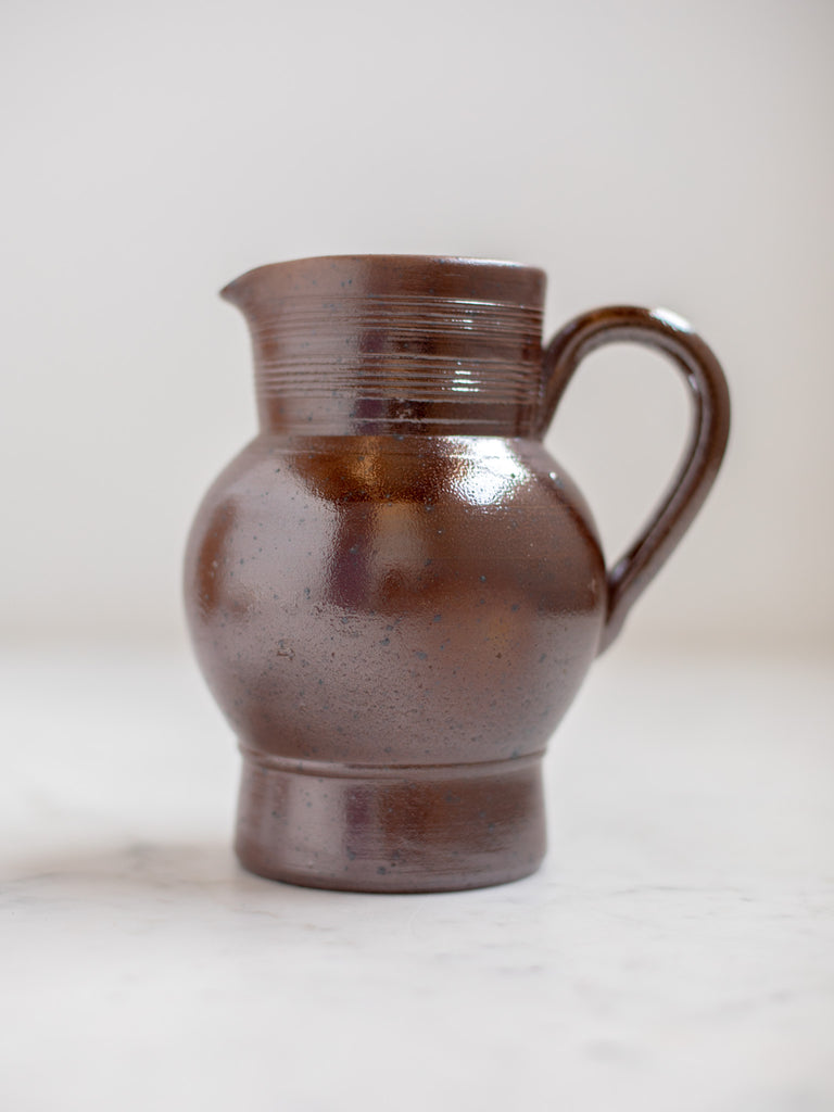 Dark brown pitcher. 