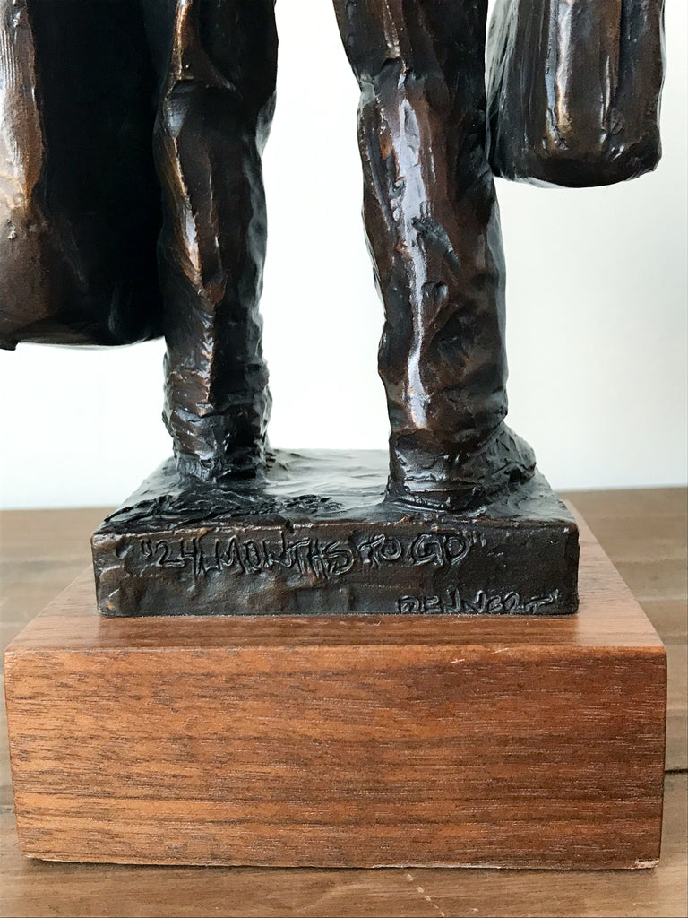 Bronze statue artist signature