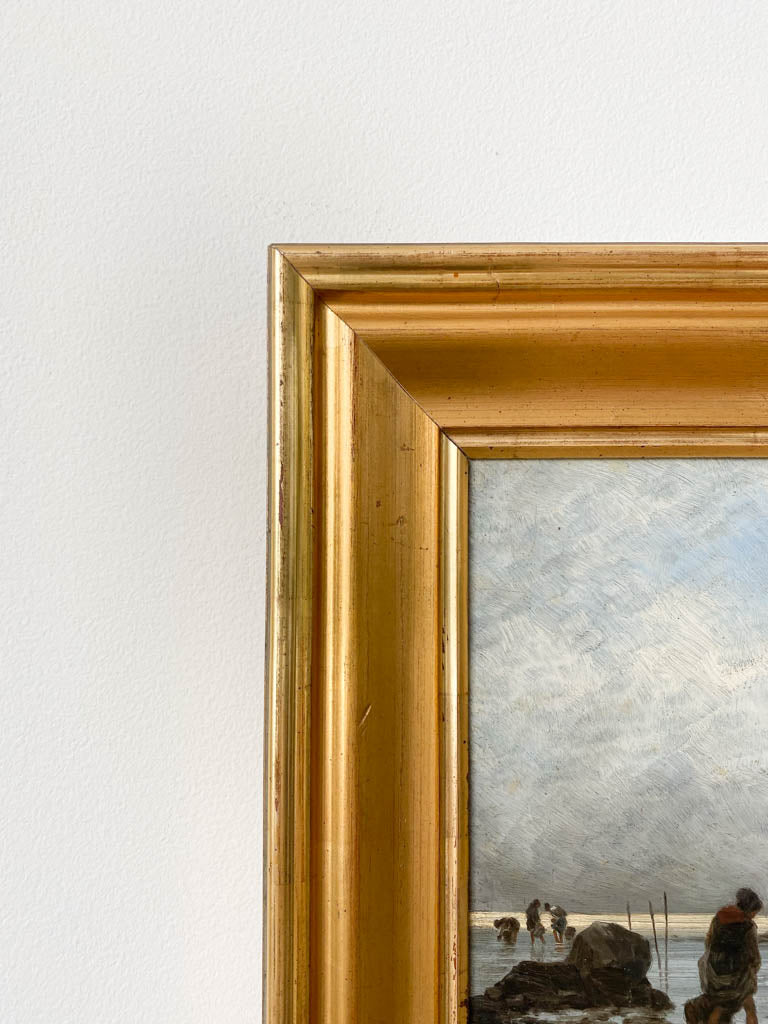 Corner of framed original. Canvas texture and thick gold frame.