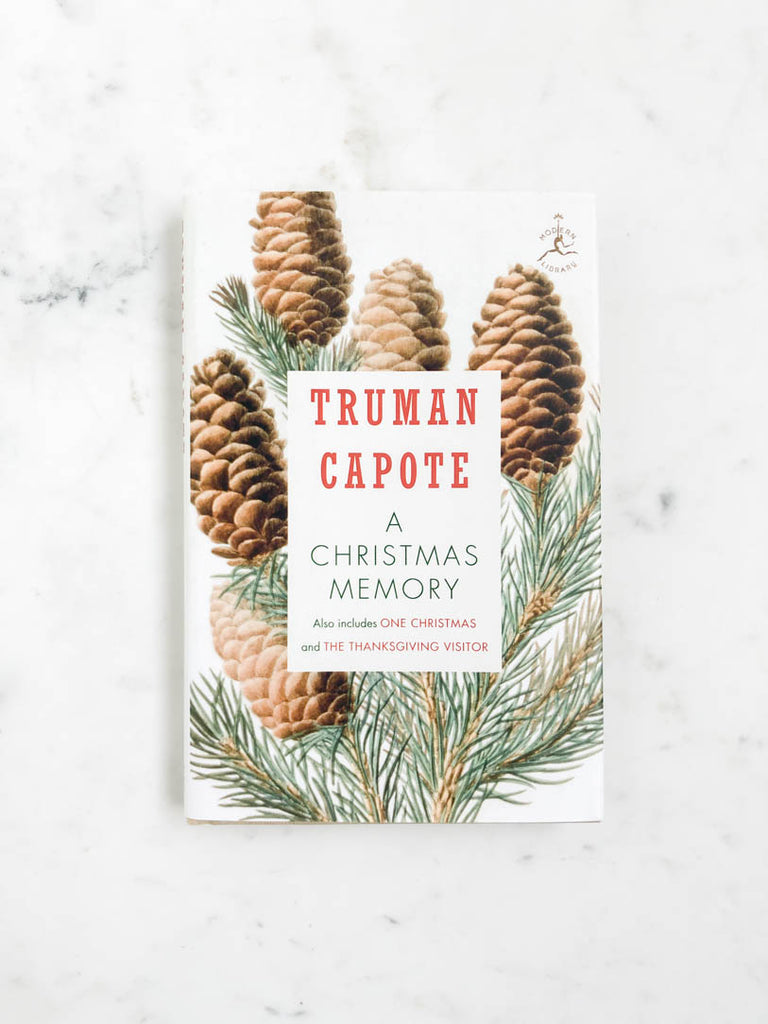 Book cover with pinecones labeled "A Christmas Story" by Truman Capote
