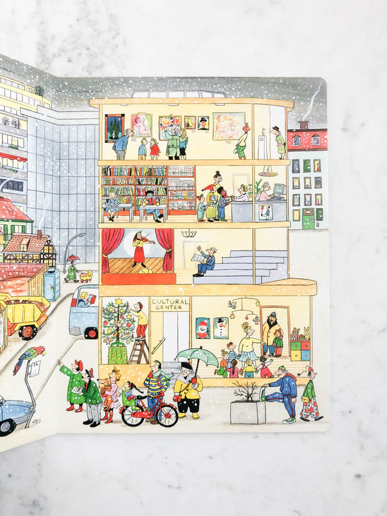 Sample page of “Winter”. Centers on an apartment full of people and activities. Snow is falling outside.