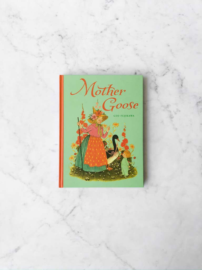 Mother Goose book cover depicting a woman wearing a large hat and colorful dress standing next to a goose and a little boy.