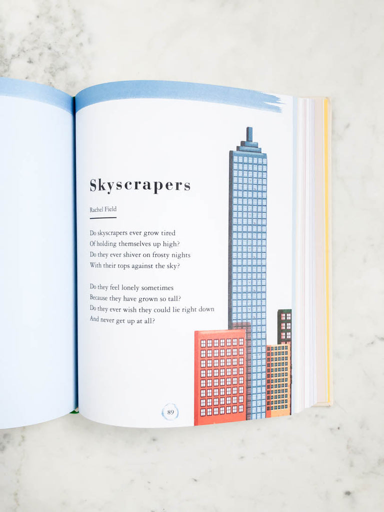 Sample page from a book showing city buildings and text