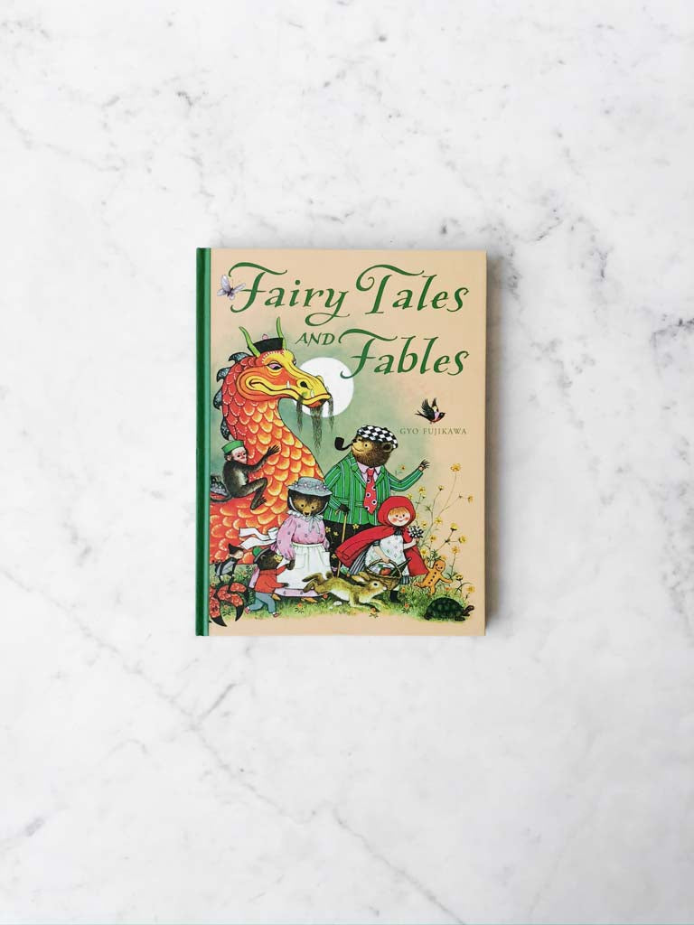 Fairy Tales and Fables cover displaying different fairy tale creatures such as a dragon, bears, and little red riding hood.