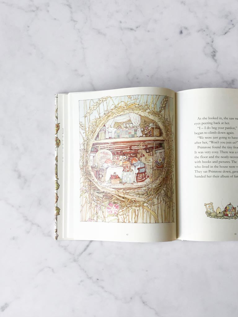 A page of a book displaying an art work of different characters inside of a house, looking in through a window.