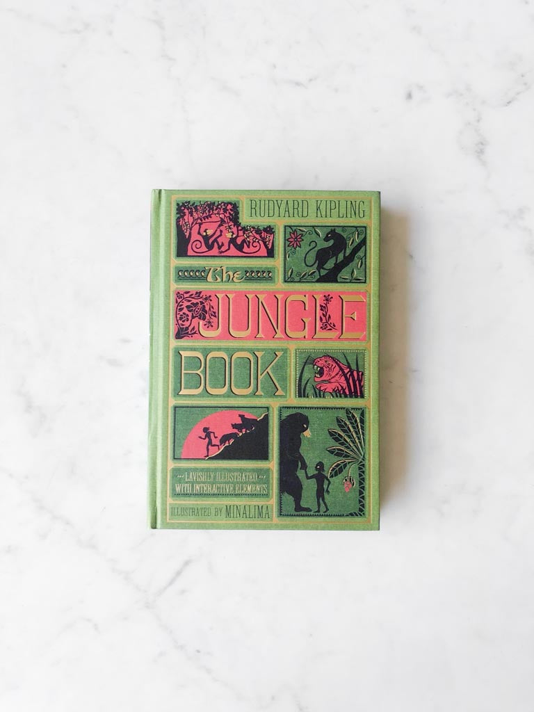 The cover of The Jungle Book in both green and red colors showing multiple characters and animals from the story with a large gold lettered title.