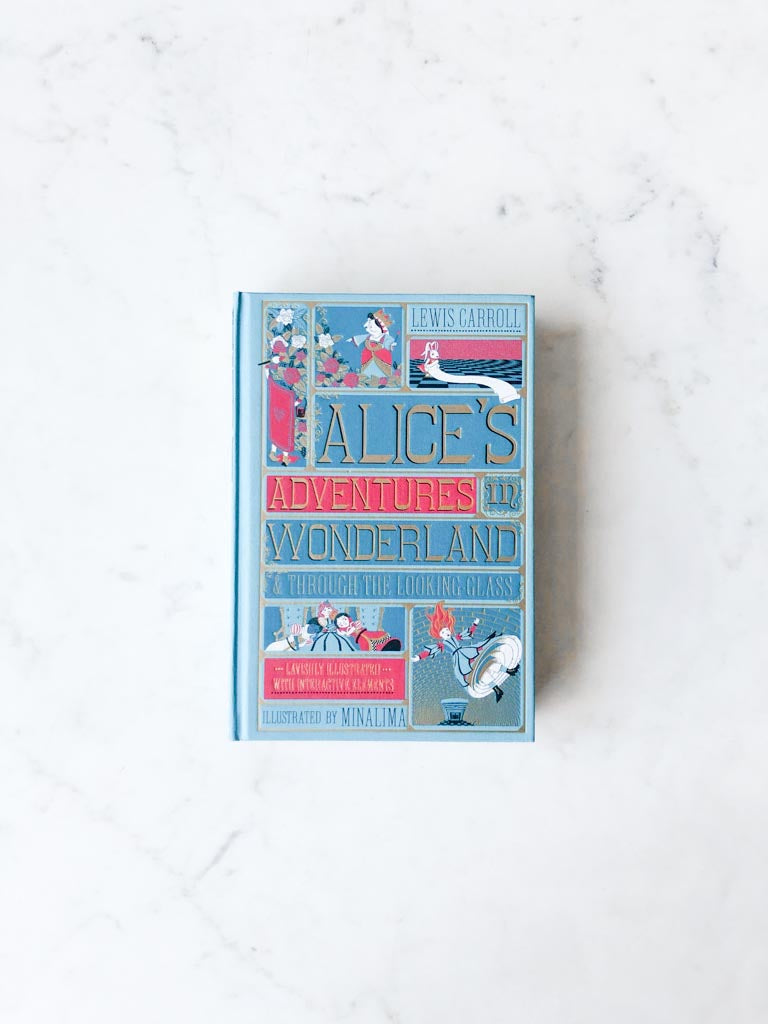 The cover of Alice’s Adventures in Wonderland, a blue cover with red accents and different characters and scene art on display with the title in a large gold lettered font.