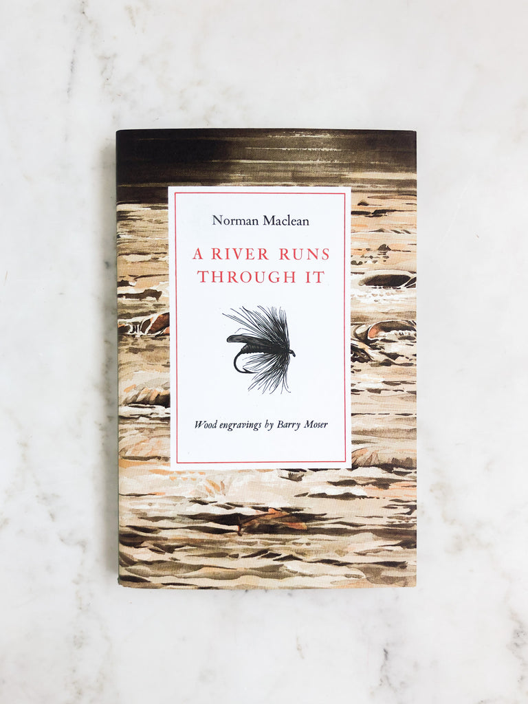Book cover labeled "A River Runs Through It" with an image of a river in the background