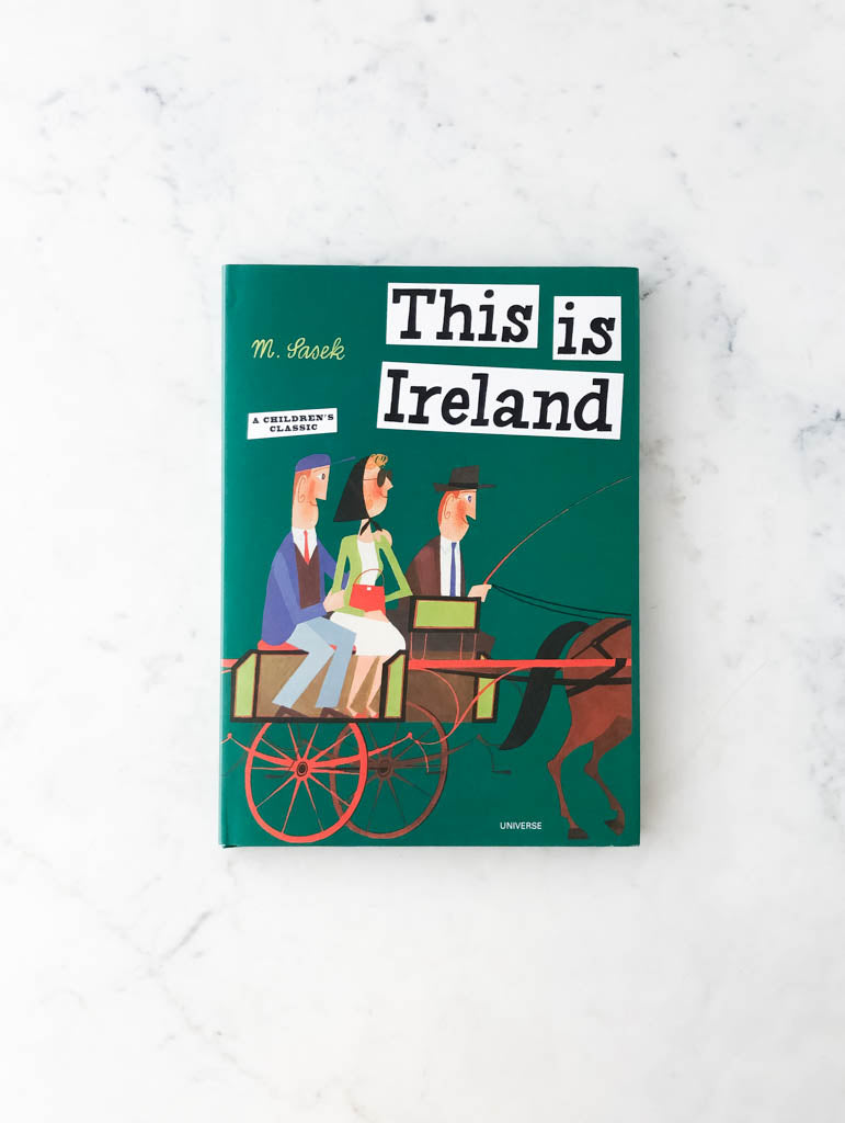 Green family friendly book cover labeled "This is Ireland". Image on book shows a couple riding a cart led by a horse.