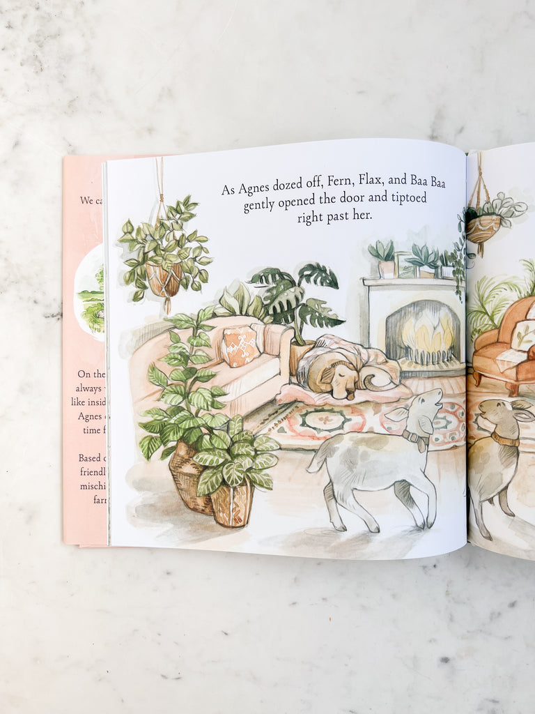 Another sample page of “Agnes and the Sheep”. Agnes, a dog, is dozing off in a blanket by the fire while the sheep get into mischief.