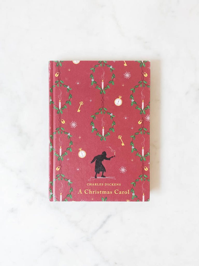 Red book cover labeled "A Christmas Carol"