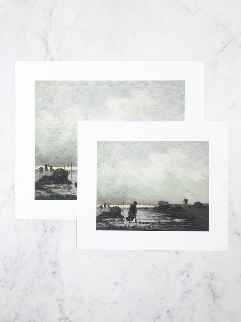 Close up of two unframed prints on canvas.